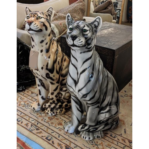 591 - CONTEMPORARY SCHOOL CERAMIC CATS, four of differing descriptions, 88cm. (4)