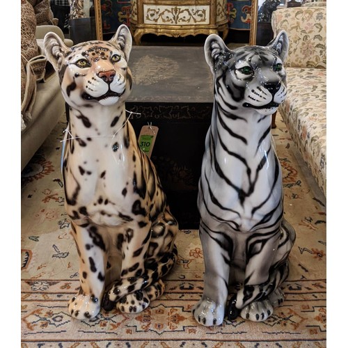 591 - CONTEMPORARY SCHOOL CERAMIC CATS, four of differing descriptions, 88cm. (4)