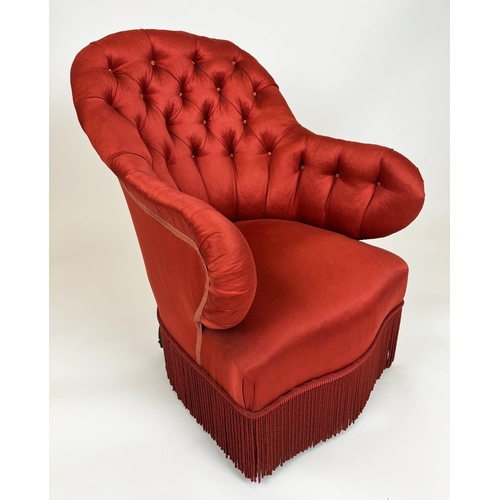 203 - ARMCHAIR, French mid 19th century, deep buttoned, on mahogany legs and brass casters, red cotton sat... 