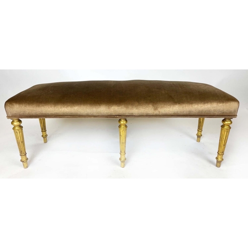 198 - WINDOW SEAT, Regency style giltwood, upholstered in gold fabric, on turned legs, 124cm H x 39cm x 43... 