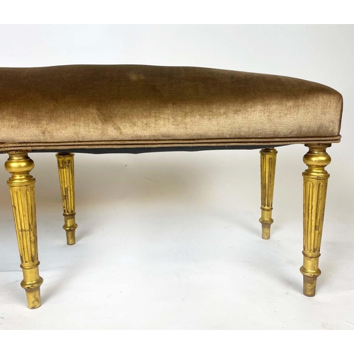 198 - WINDOW SEAT, Regency style giltwood, upholstered in gold fabric, on turned legs, 124cm H x 39cm x 43... 