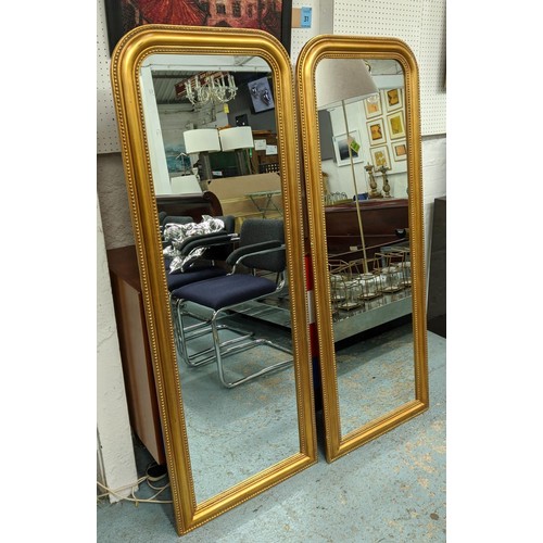 413 - LOUIS PHILIPP STYLE WALL MIRRORS, a pair, gilt frames, 149cm x 56cm.