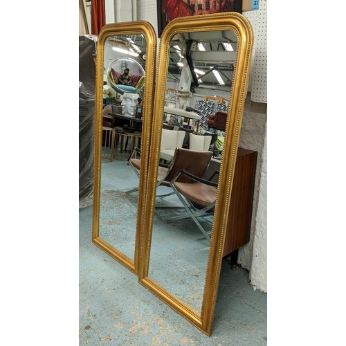 413 - LOUIS PHILIPP STYLE WALL MIRRORS, a pair, gilt frames, 149cm x 56cm.