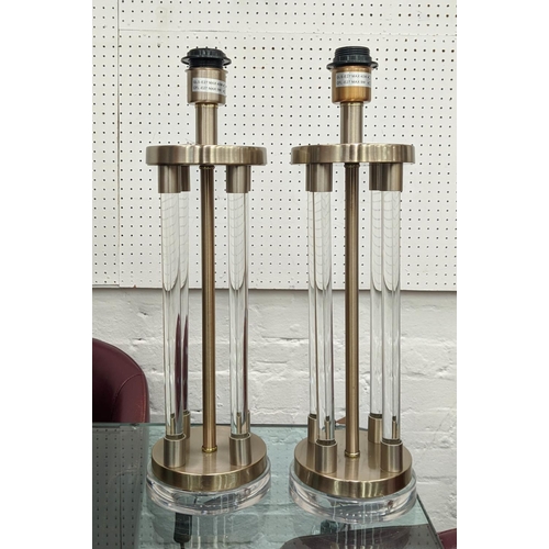 591 - TABLE LAMPS, a pair, bases including stems each 53cm H, perspex columns with shades.