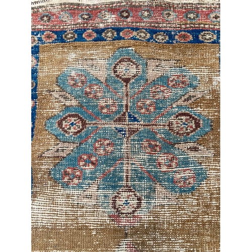 106 - ANTIQUE HERIZ RUNNER, 255cm x 78cm.