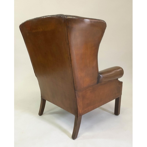 135 - WING ARMCHAIR, George III design buttoned hand dyed natural studded leather and square supports, 84c... 