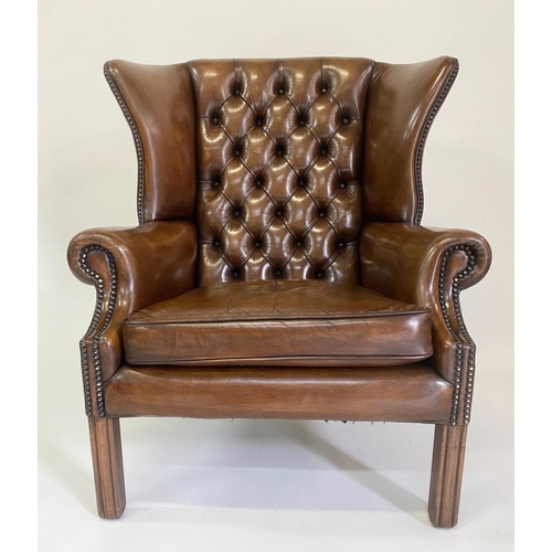 135 - WING ARMCHAIR, George III design buttoned hand dyed natural studded leather and square supports, 84c... 