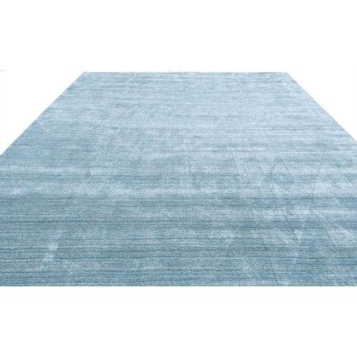 87 - CONTEMPORARY CARPET, 301cm x 240cm, sky blue field.