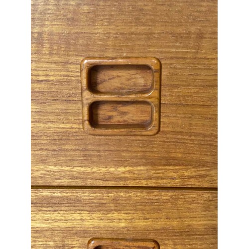 357 - TEAK CHEST, 1960s teak with four long drawers, 87cm W x 40cm D x 70cm H.