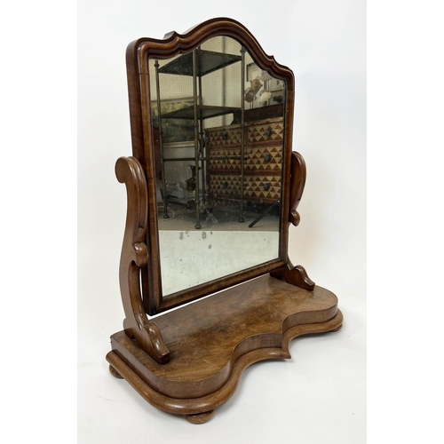 602 - VANITY MIRROR, Victorian flame mahogany, arched top with moulded edge on bun feet, 80cm H x 65cm W.