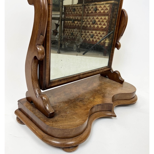 602 - VANITY MIRROR, Victorian flame mahogany, arched top with moulded edge on bun feet, 80cm H x 65cm W.