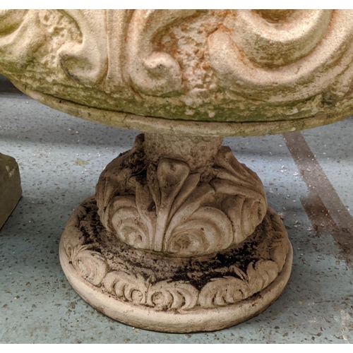 365 - GARDEN URNS, a set of two, composite stone, foliate design, another of swirl design, 67cm x 47cm dia... 