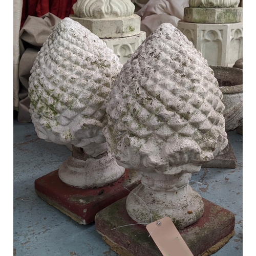 366 - ARCHITECTURAL GARDEN ARTICHOKE FINIALS, a set of three, 60cm H at tallest, composite stone. (3)