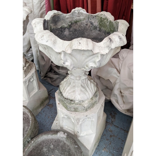 373 - ARCHITECTURAL GARDEN URNS ON STANDS, a pair, 100cm x 47cm diam, composite stone, Gothic revival styl... 