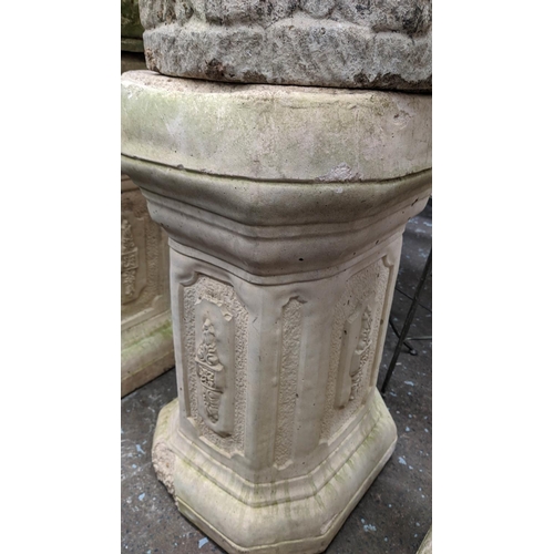 376 - ARCHITECTURAL GARDEN PEDESTALS, a set of three, 100cm at tallest, each with differing planter, compo... 