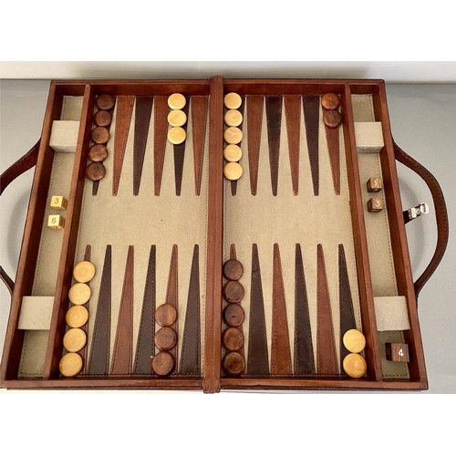 385 - BACKGAMMON SET, 7cm x 23cm x 40cm, leathered case.