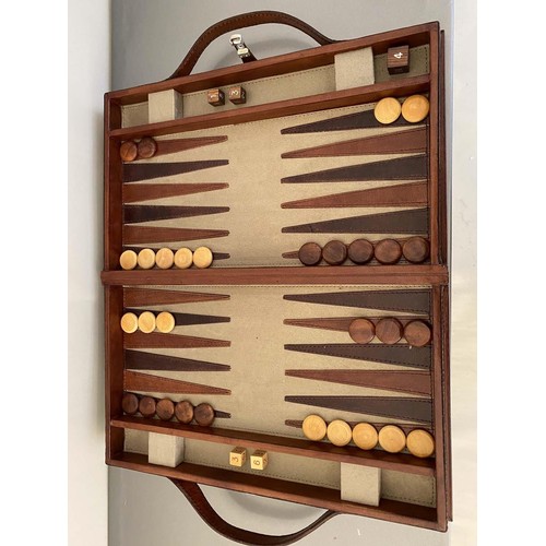 385 - BACKGAMMON SET, 7cm x 23cm x 40cm, leathered case.