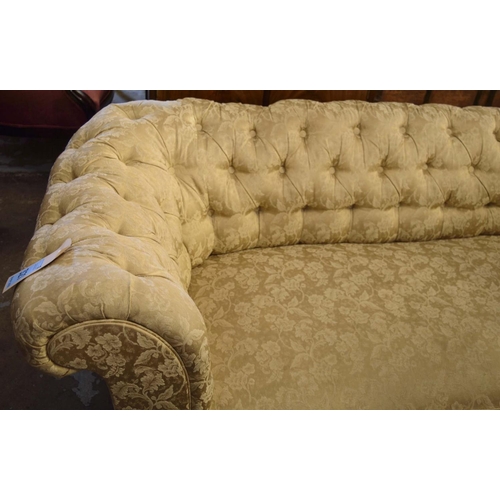 123 - CHESTERFIELD SOFA, 67cm H x 207cm W, 19th century manner mahogany in gold damask.