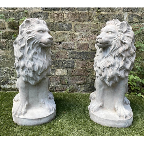 588 - GARDEN LIONS, a pair, stone effect, 63cm H. (2)