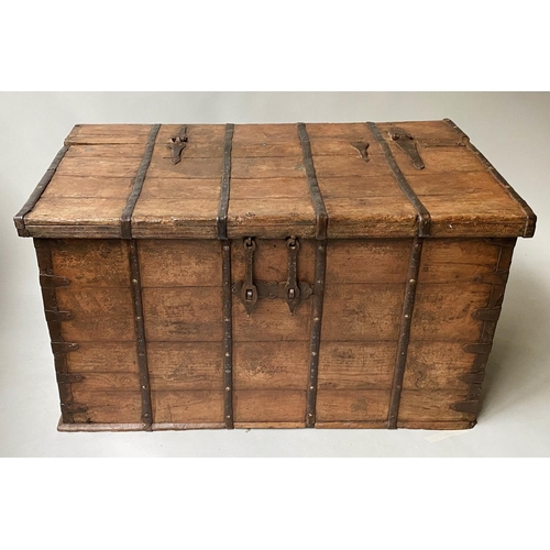 590 - INDIAN TRUNK, 19th century North Indian, teak and metal bound with rising lid and carrying handles, ... 