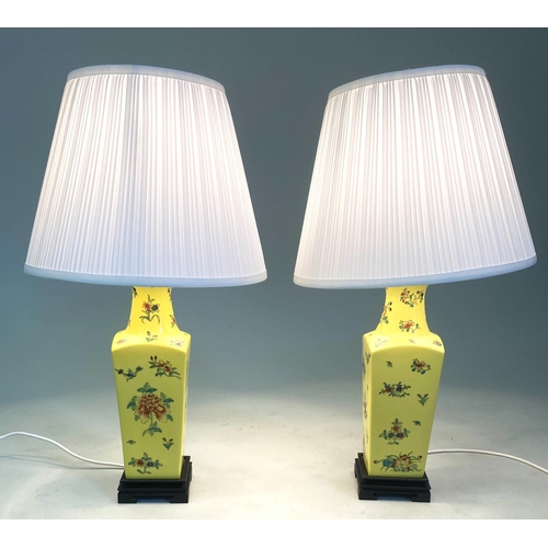 591 - TABLE LAMPS, a pair, Chinese ceramic yellow ground vase form with shades, 60cm H. (2)