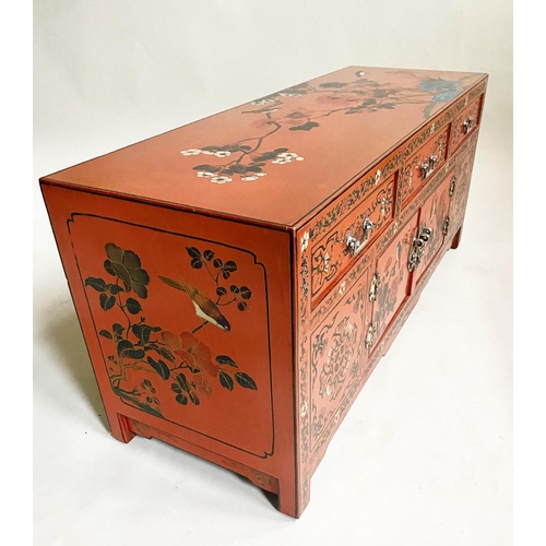 579 - LOW CHINESE SIDE CABINET, early 20th century, scarlet lacquered, with incised decoration, two cupboa... 