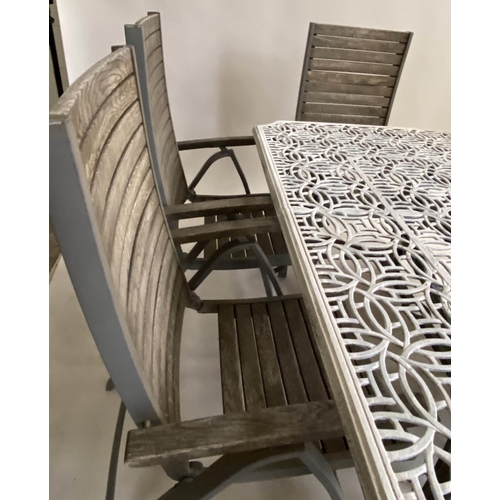 575 - GARDEN TABLE AND CHAIRS, pierced cast aluminium top, with six folding metal framed and teak slatted ... 