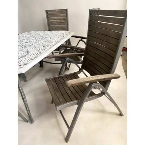 575 - GARDEN TABLE AND CHAIRS, pierced cast aluminium top, with six folding metal framed and teak slatted ... 