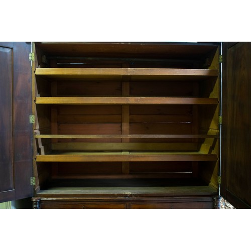 577 - LINEN PRESS, Regency mahogany, with arched cornice, spiral columns, three sliding trays, two doors a... 