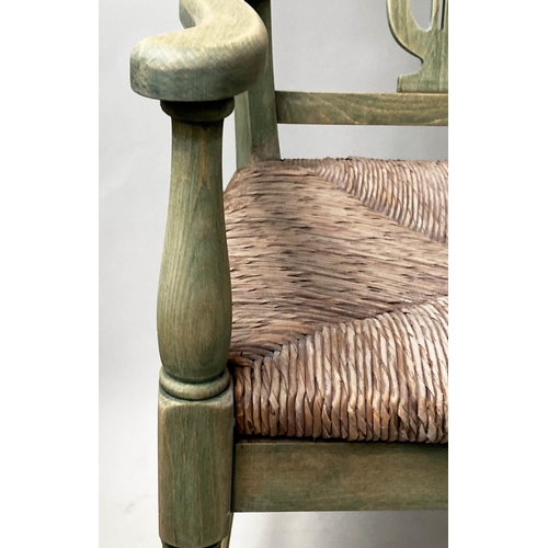 595 - HALL BENCH, vintage, green stained, with raised lyre back and rush seat, 114cm W.