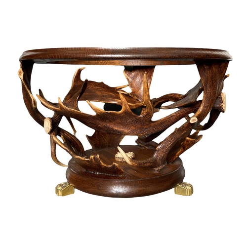 141 - FALLOW ANTLER LOW TABLE, 65cm diam x 45cm H, bone inlay detail, glass top.