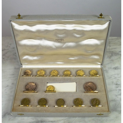 15 - HERMES COIN PLACE CARD HOLDERS,  a set of fourteen boxed, a set of eight Cartier silver salt and pep... 