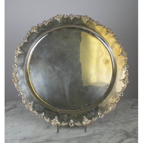 16 - LARGE SERVING TRAY, marked 'silver K.M.S.' with rococo scrolling border, 60cm D.