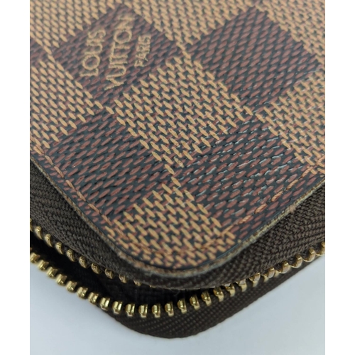 28 - LOUIS VUITTON DAMIER EBENE WALLET, zip throughout, coin compartment, a note compartment, card slots ... 