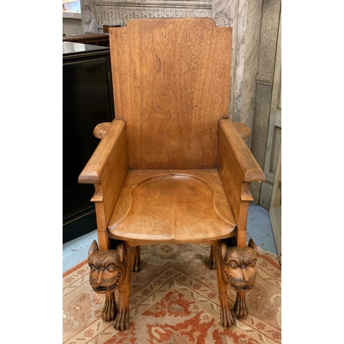 120 - THRONE CHAIR, 117cm H x 67cm W x 77cm D, Egyptian Revival teak, carved with eagles, raised on cat su... 