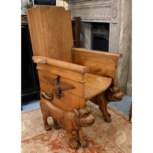 120 - THRONE CHAIR, 117cm H x 67cm W x 77cm D, Egyptian Revival teak, carved with eagles, raised on cat su... 