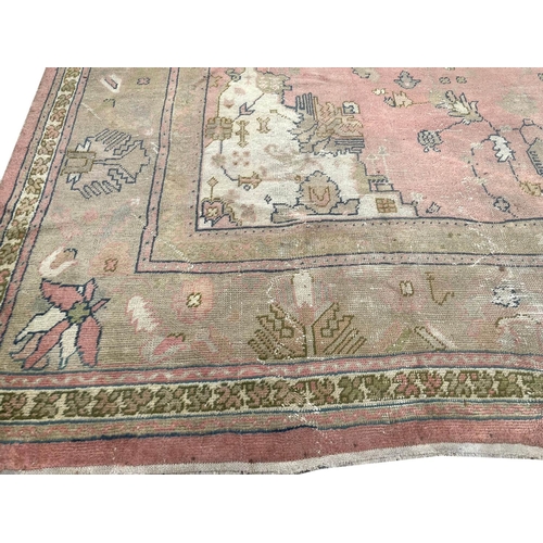 95 - ANTIQUE TURKISH CARPET, 660cm x 405cm, of country house proportions.