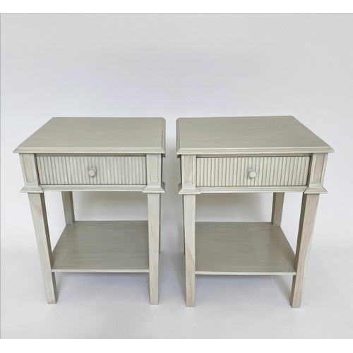 144 - OKA LAMP TABLES, a pair, distressed grey painted with fluted front drawer and undertier. (2)