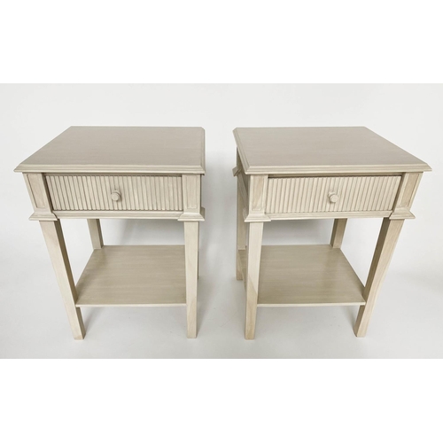 144 - OKA LAMP TABLES, a pair, distressed grey painted with fluted front drawer and undertier. (2)