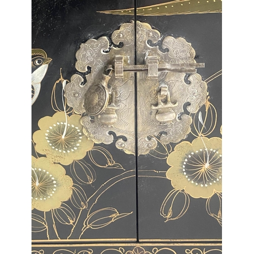 147 - CABINET, Chinese black lacquered and gilt Chinoiserie decorated with drawer and doors together with ... 