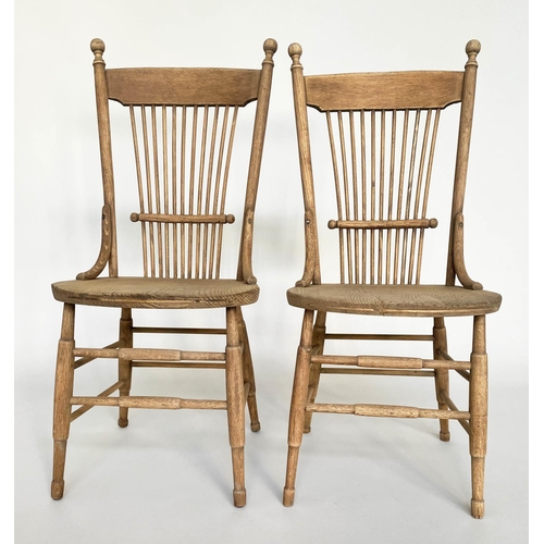 150 - SIDE CHAIRS, a pair, early 20th century American oak with spindle backs. (2)