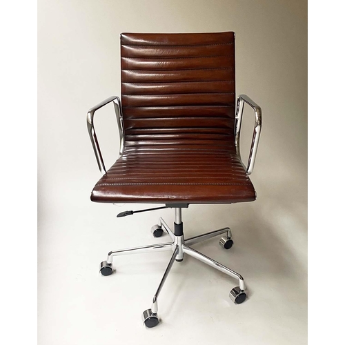 259 - REVOLVING DESK CHAIR, Charles and Ray Eames inspired with ribbed tan brown leather seat revolving an... 