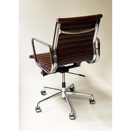 259 - REVOLVING DESK CHAIR, Charles and Ray Eames inspired with ribbed tan brown leather seat revolving an... 