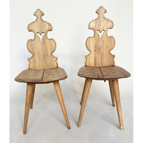 262 - SWISS HALL CHAIRS, a pair traditional elm with pierced backs, dowelled and cleated. (2)