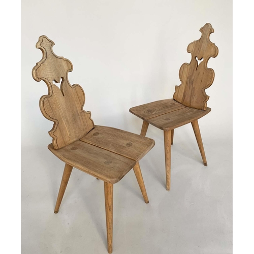 262 - SWISS HALL CHAIRS, a pair traditional elm with pierced backs, dowelled and cleated. (2)