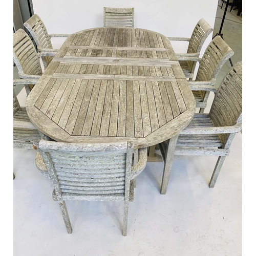 263 - EXTENDING GARDEN TABLE AND CHAIRS, a set, silvery weathered teak with eight armchairs and extending ... 