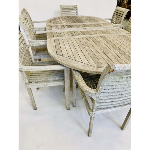 263 - EXTENDING GARDEN TABLE AND CHAIRS, a set, silvery weathered teak with eight armchairs and extending ... 