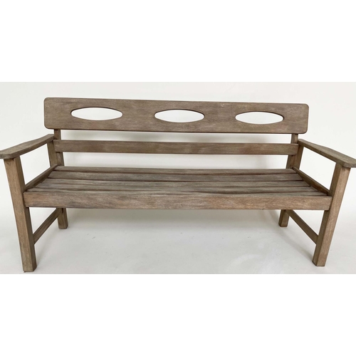 265 - GARDEN BENCH BY SWANN HATTERSLEY, 1960's teak with incised solid back and slatted seat, 152cm W.