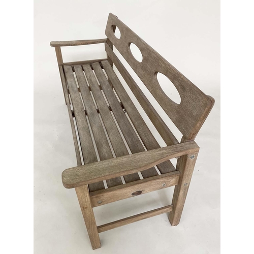 265 - GARDEN BENCH BY SWANN HATTERSLEY, 1960's teak with incised solid back and slatted seat, 152cm W.