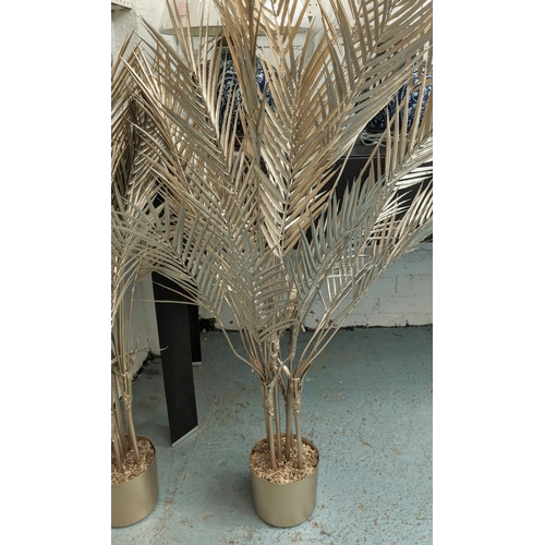 519 - FAUX PALM TRESS, a pair, 130cm H approx, gilt finish, potted. (2)